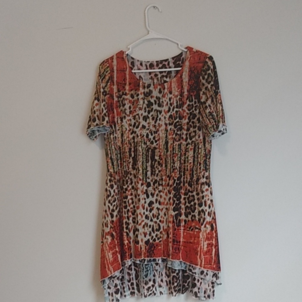 Reversible angled, short sleeve dress.